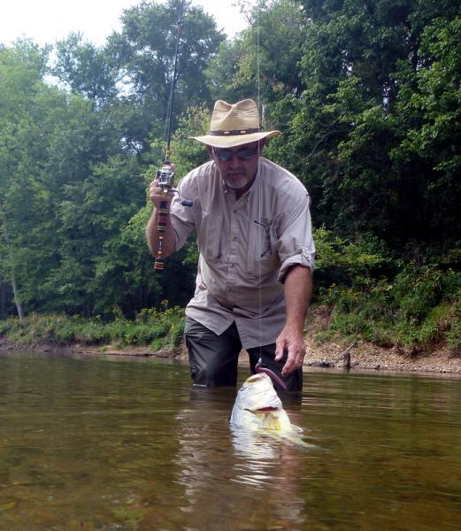 P1000704.jpg, Cooper reaching for river largemouth.jpg, small.jpg