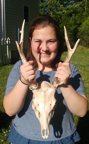 Livie with Sika skull.jpg